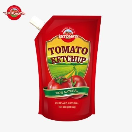 Sachet de ketchup pur à saveur naturelle de 56 g, conforme aux normes internationales de production.