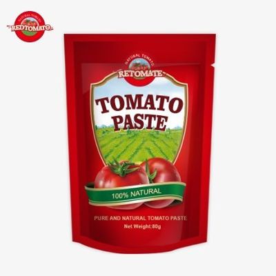 80 g de pâte de tomate double concentrée emballée dans une poche debout avec des niveaux de pureté variant de 30% à 100%