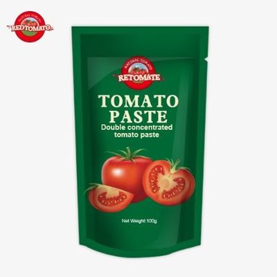 Pâte de tomate à 100% de pureté emballée dans un sachet de 100 g