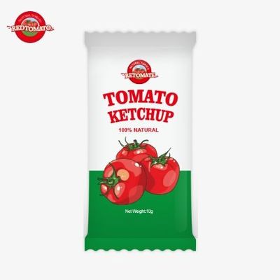 Un sachet de ketchup de tomate de 10 grammes offre une saveur sucrée riche faite d'ingrédients naturels, disponible à un prix d'usine